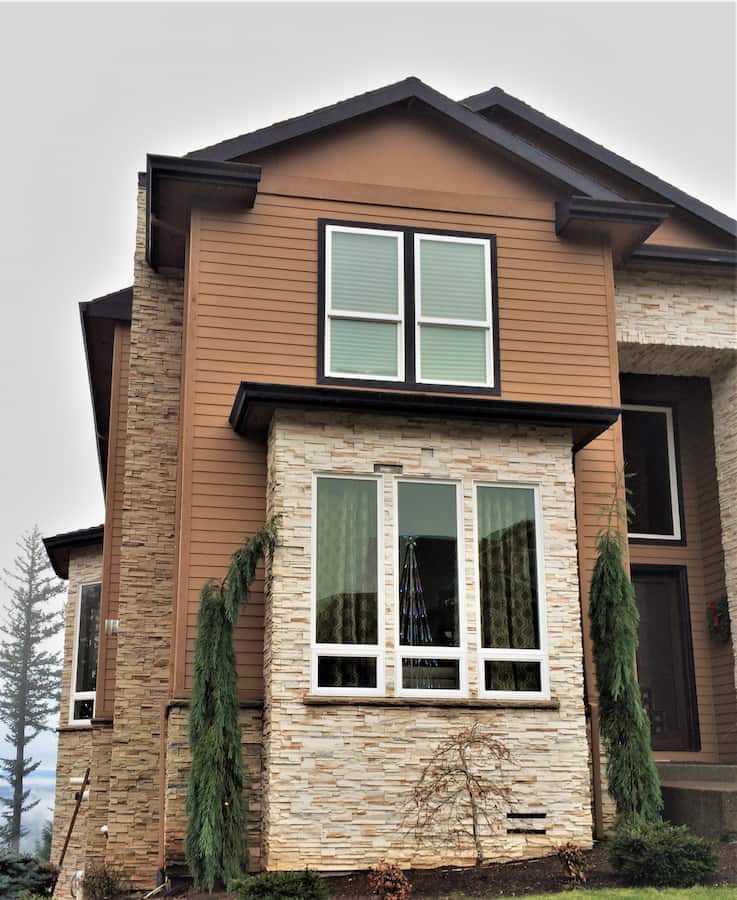 Black box-bottom gutter installed along a home's roof edge